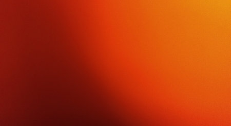 Orange and red gradient abstract background with copy space for text or imageの素材