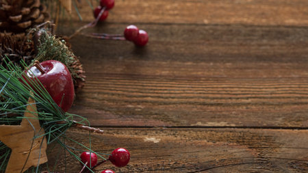Christmas decoration on rustic wooden background with copy space for your textの素材