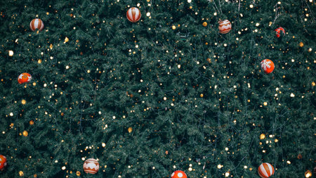 Christmas tree decorated with baubles and garland. Christmas backgroundの素材