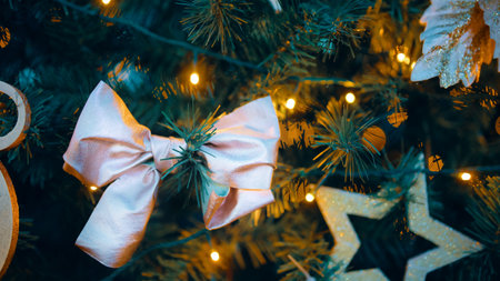 Christmas tree decorated with toys and garlands. Christmas and New Year backgroundの素材