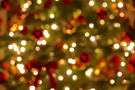 Defocused abstract christmas background with bokeh defocused lightsの素材