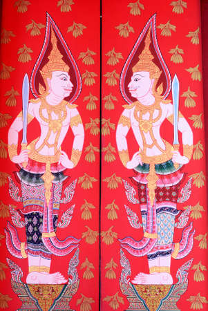 BANGKOK, THAILAND - AUGUST 17   Traditional Thai ancient painting art on wood windows at Wat Mahathat Yuwaratrangsarit on August 17, 2013 in Bangkok, Thailand のeditorial素材