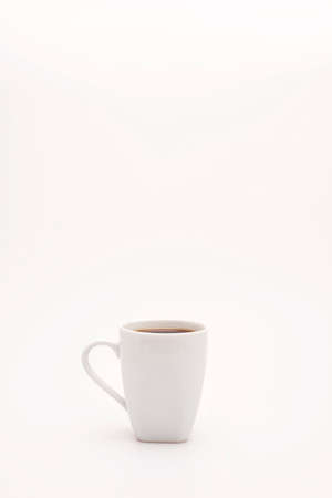 Black coffee in white cup on a white background  Black and white の写真素材