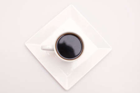 Black coffee in white cup on a white background  Black and white の写真素材