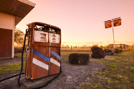 Old rusted pump in the outbackの写真素材