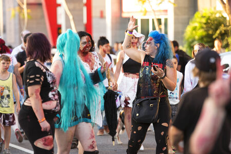 Brisbane, Queensland, Australia - October 5th 2014: Annual brain foundation zombie walk October 5th, 2014 in West end, Brisbane, Australia. Crowd of participants on the day walking the street.のeditorial素材