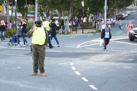Brisbane, Queensland, Australia - October 5th 2014: Annual brain foundation zombie walk October 5th, 2014 in West end, Brisbane, Australia. Crowd controllers controlling streets.のeditorial素材
