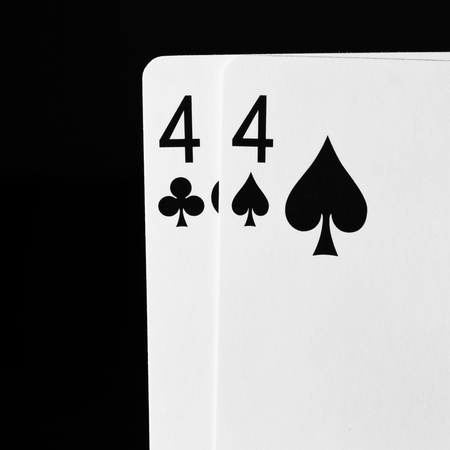 A pair of high contrast black and white image of playing cards close up.の写真素材
