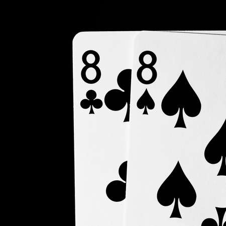 A pair of high contrast black and white image of playing cards close up.の写真素材