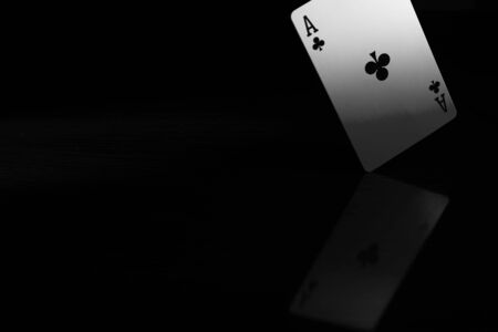 A pair of high contrast black and white image of playing cards close up.の写真素材