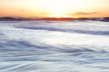 Sea foam created by the agitation of seawater located at Snapper Rocks Gold Coast New South Wales...