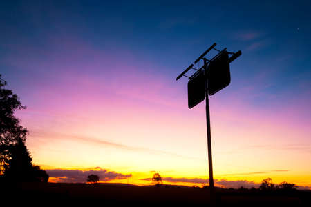 Rusted fuel station silhouette sign in the outbacks of Brisbane Queensland.の写真素材