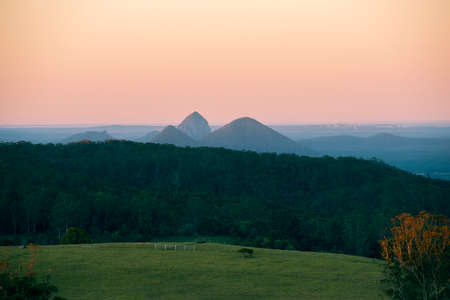 View from Dahmongah lookout in Mount Mee at dusk.の写真素材
