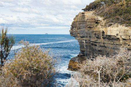 Daytime view of Devils Kitchen Beach, Eaglehawk Neck, Tasmania.の写真素材
