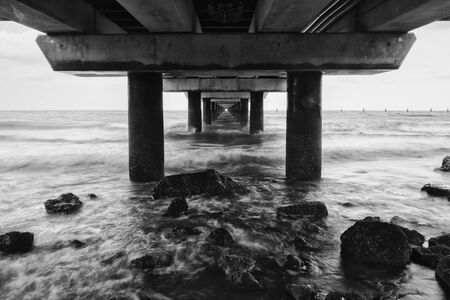Black and white image of Shorncliffe Pier in Queensland, Australia.の写真素材