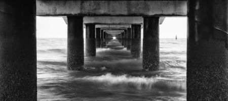 Black and white image of Shorncliffe Pier in Queensland, Australia.の写真素材