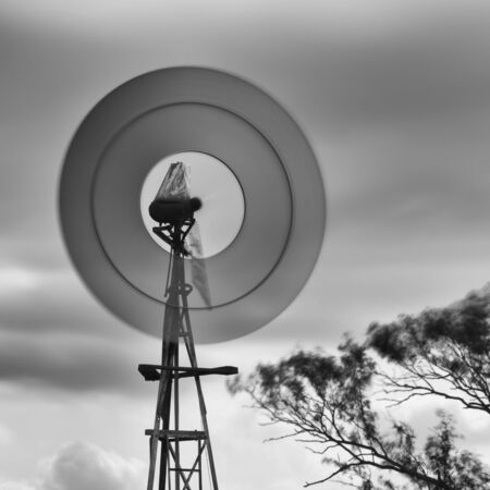 Windmill in the countryside of Queensland, Australia. Black and White.の写真素材
