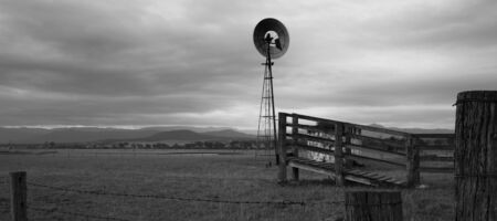 Windmill in the countryside of Queensland, Australia. Black and White.の写真素材