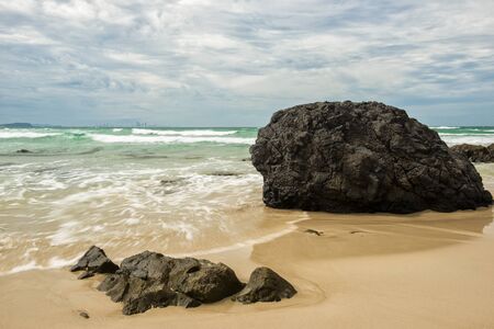 Waves and beach at Snapper Rock, New South Wales during the day.の写真素材