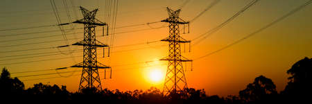 High voltage power tower at sunset in Brisbane, Queensland.