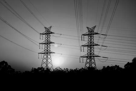 High voltage power tower at sunset in Brisbane, Queensland.の写真素材