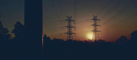 High voltage power tower at sunset in Brisbane, Queensland.の写真素材