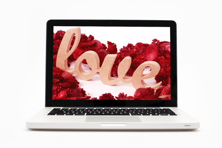 Sleek looking metallic finishing laptop on a white backgroundの写真素材