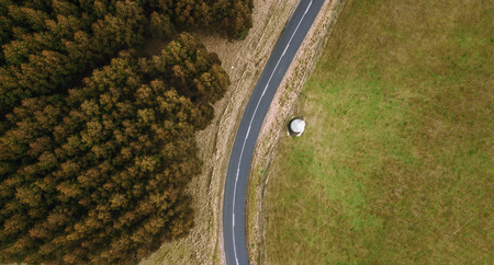 Road and field out in the Tasmanian countryside during the day.の写真素材