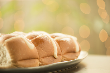Tasty traditional Easter hot cross buns, closeup view.の写真素材