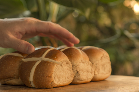 Tasty traditional Easter hot cross buns, closeup view.の写真素材