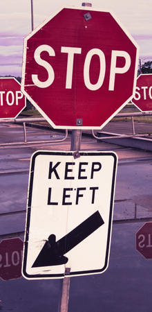 Close up of a red and white road stop sign.