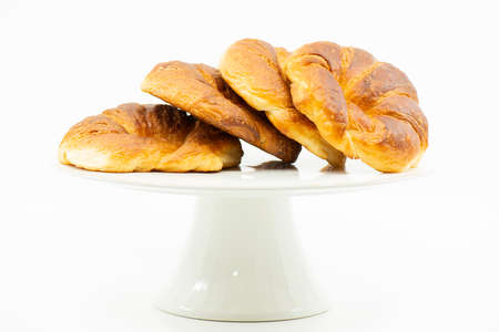 Detailed close up of delicious buttery plain croissantsの写真素材