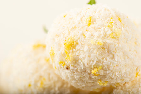 Delicious keto coconut and lemon truffles made with sour cream and cream cheese.の写真素材