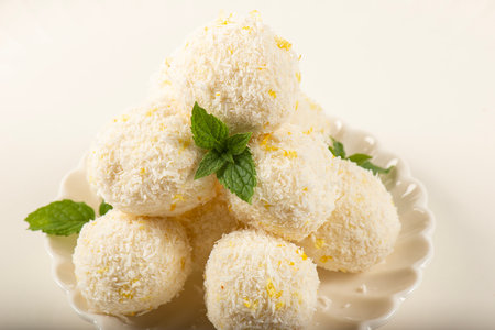 Delicious keto coconut and lemon truffles made with sour cream and cream cheese.の写真素材