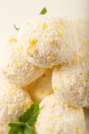 Delicious keto coconut and lemon truffles made with sour cream and cream cheese.の写真素材