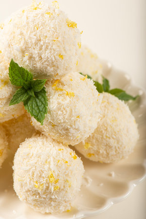 Delicious keto coconut and lemon truffles made with sour cream and cream cheese.の写真素材