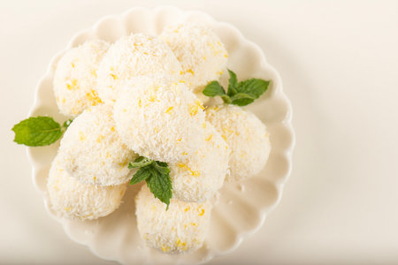 Delicious keto coconut and lemon truffles made with sour cream and cream cheese.の写真素材