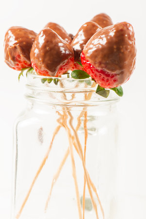 Delicious chocolate fondue and fresh strawberryの写真素材