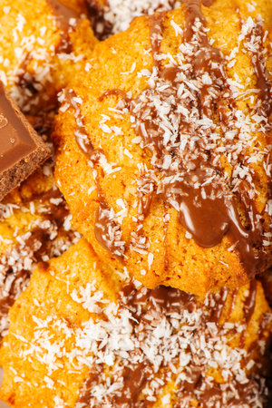 Fresh-baked Snickerdoodle cookies with chocolate and shredded coconut.の写真素材