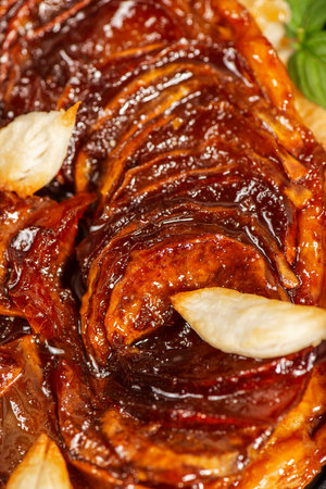 Delicious apple Tarte Tatin with sweet red apple, caramel and puff pastryの写真素材