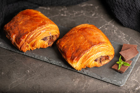 Delectable golden brown baked Pain au chocolat.の写真素材