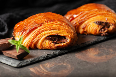 Delectable golden brown baked Pain au chocolat.の写真素材