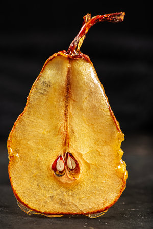 Candied pear chips, first dehydrated and then dipped in a caramel sugar solution and left to dry.の写真素材