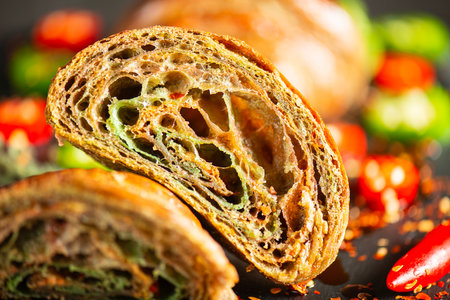 Homemade Tri-colour croissant with Jalapeno, birds eye and cayenne chilli butter.の写真素材