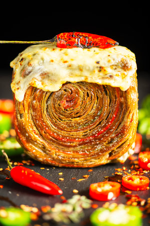 Homemade Tri-colour croissant with Jalapeno, birds eye and cayenne chilli butter.の写真素材