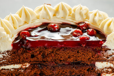 Black forest gateaux cake with a chocolate sponge, cherry compote, and Chantilly cream. Decorated...