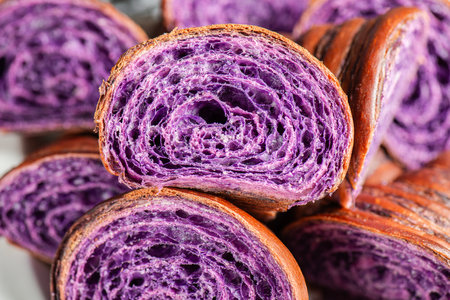 Fresh baked homemade Ube Croissant using traditional flavouring.の写真素材