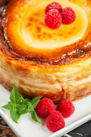 Delicious soft-baked creamy Patterson cheesecake with a spongecake base.の写真素材
