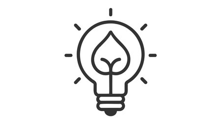 Black outlined vector illustration of a light bulb with a plant insideのイラスト素材