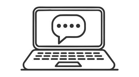 Vector icon depicting a laptop computer with a chat bubble on its screen, displaying ellipsis dots indicating a typing or waiting message.のイラスト素材